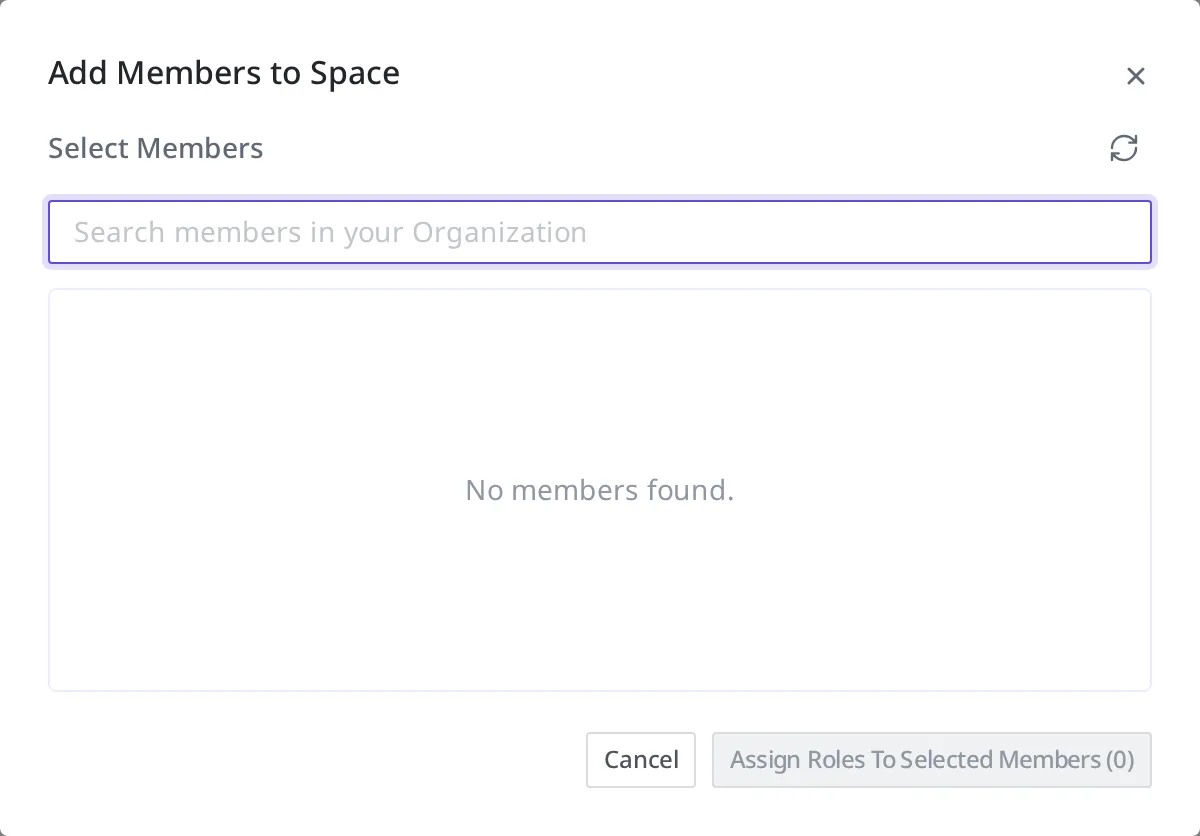 The Add Member dialog for a Space. You search for a Member within the Organization, choose one, and then assign a role