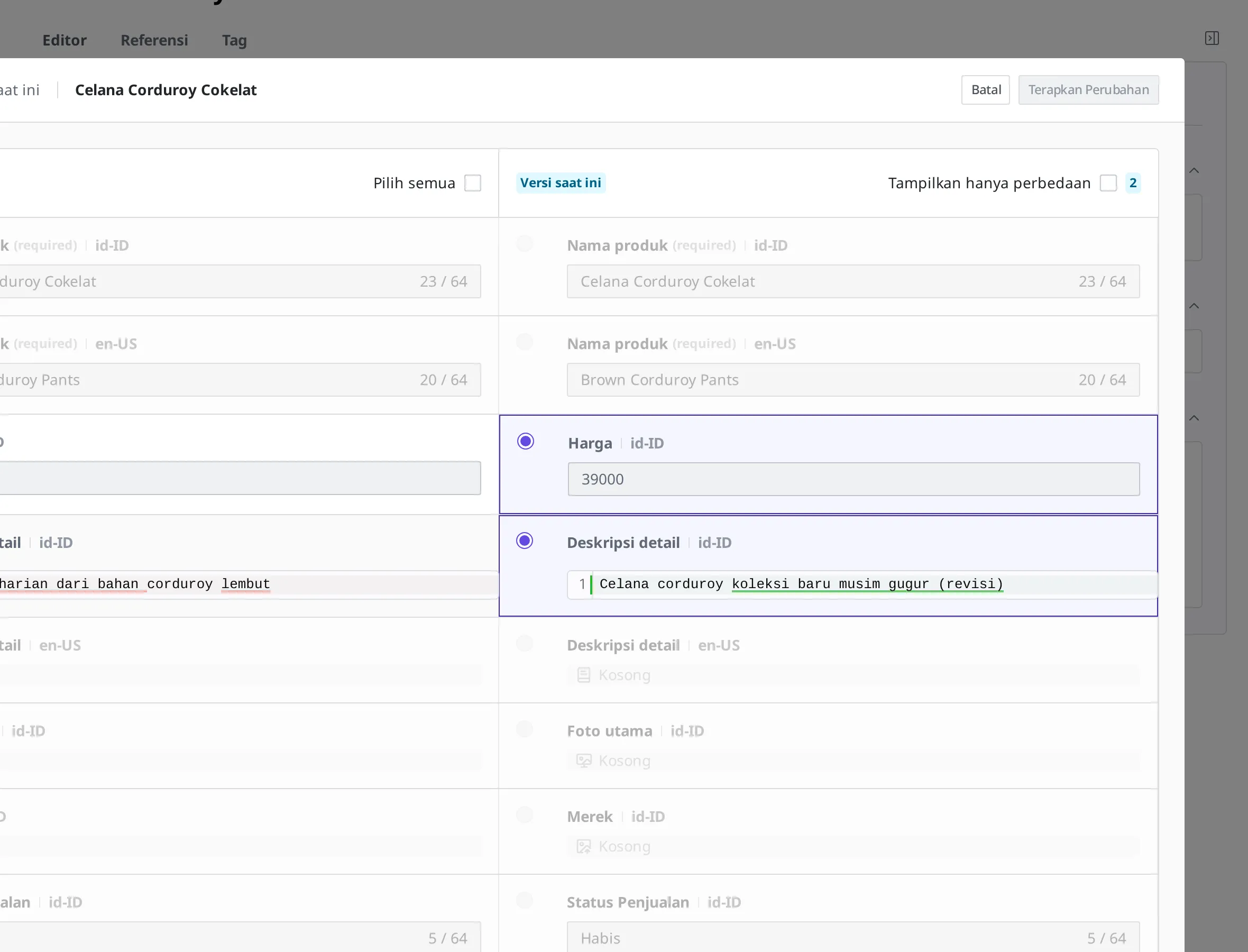 Layar yang membandingkan versi lama dan konten saat ini per item di Riwayat Publish. Teks lama dan teks saat ini dari deskripsi detail terlihat berdampingan, dan Anda bisa memilih item yang ingin dipulihkan